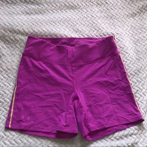 Purple under armour spandex with green seemed spandex
